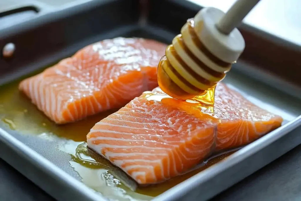 A pan with salmon being brushed with hot honey. --ar 3:2 --style raw

Alt Text: Preparing hot honey salmon in a pan